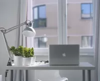 an image of a desk by the window