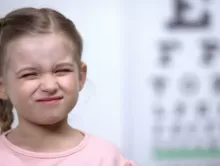 an image of a kid squinting 
