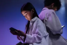 an image of kids looking at digital screens