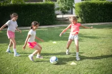 kids playing soccer outdoor