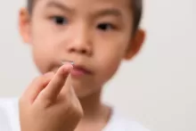 an image of a kid with contact lenses