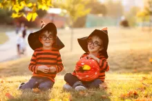 an photo of two boys in halloween costumes